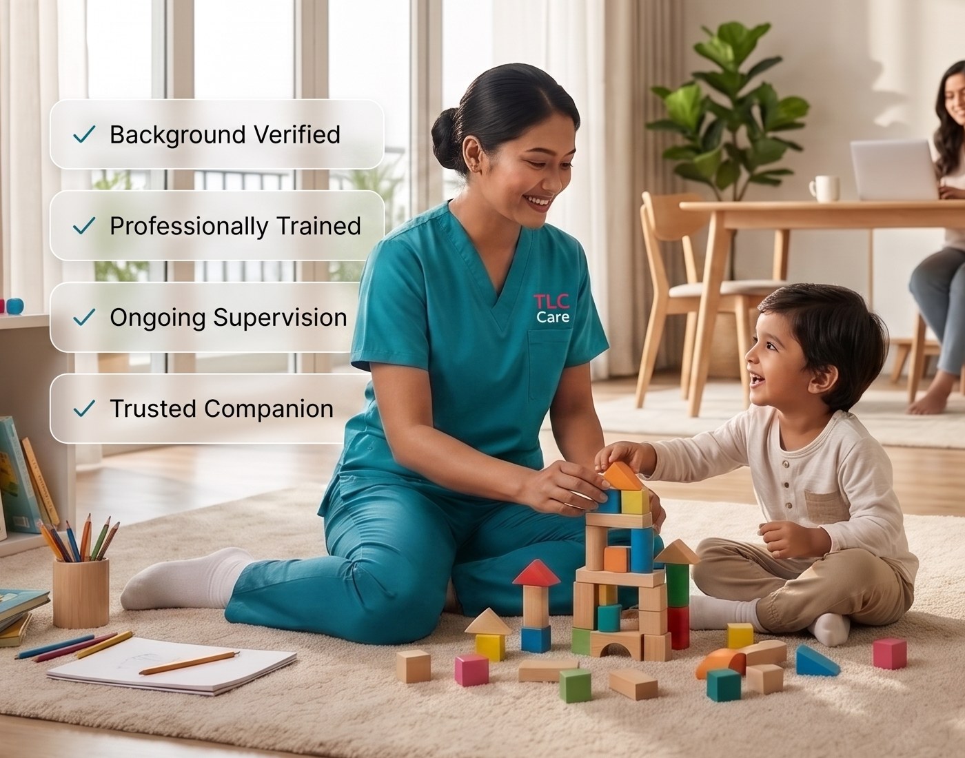A TLC caregiver in teal scrubs building a wooden block tower with a laughing toddler, with badges reading Background Verified, Professionally Trained, Ongoing Supervision, and Trusted Companion, while the child's mother works at a table in the background